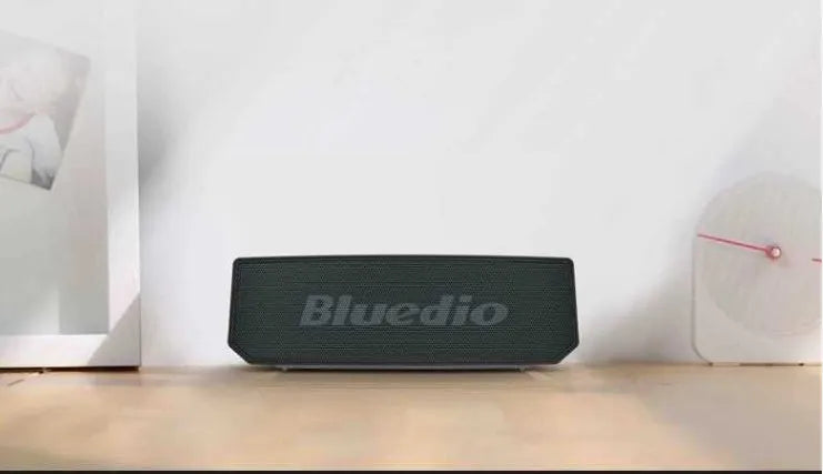 Black Bs-6 cloud smart speaker with 52mm drivers and micro-USB charging port.