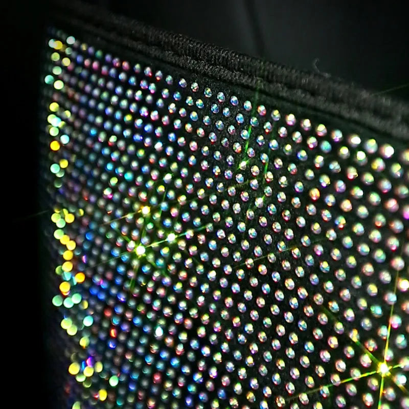 Crystal rhinestone car storage bag organizer with multi-pockets attached to backseat of car, showing white and colour options