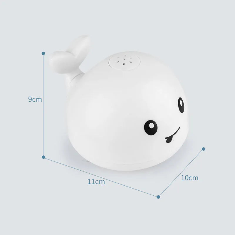 Electric whale-shaped bath spray toy with water-activated automatic spray, LED lights, and floating capability