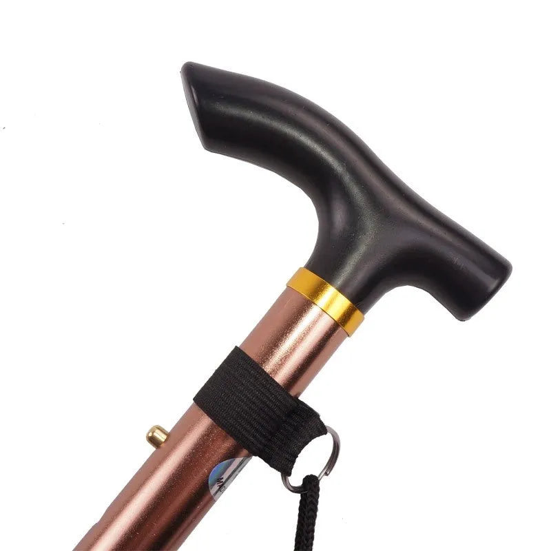 Aluminium alloy folding walking stick adjusted to mid-height, showing non-slip handle.