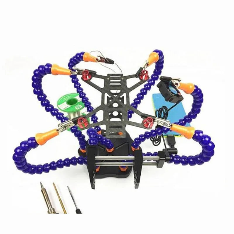 Black six-jaw aluminium welding station with multiple adjustable arms holding an electronic circuit board.