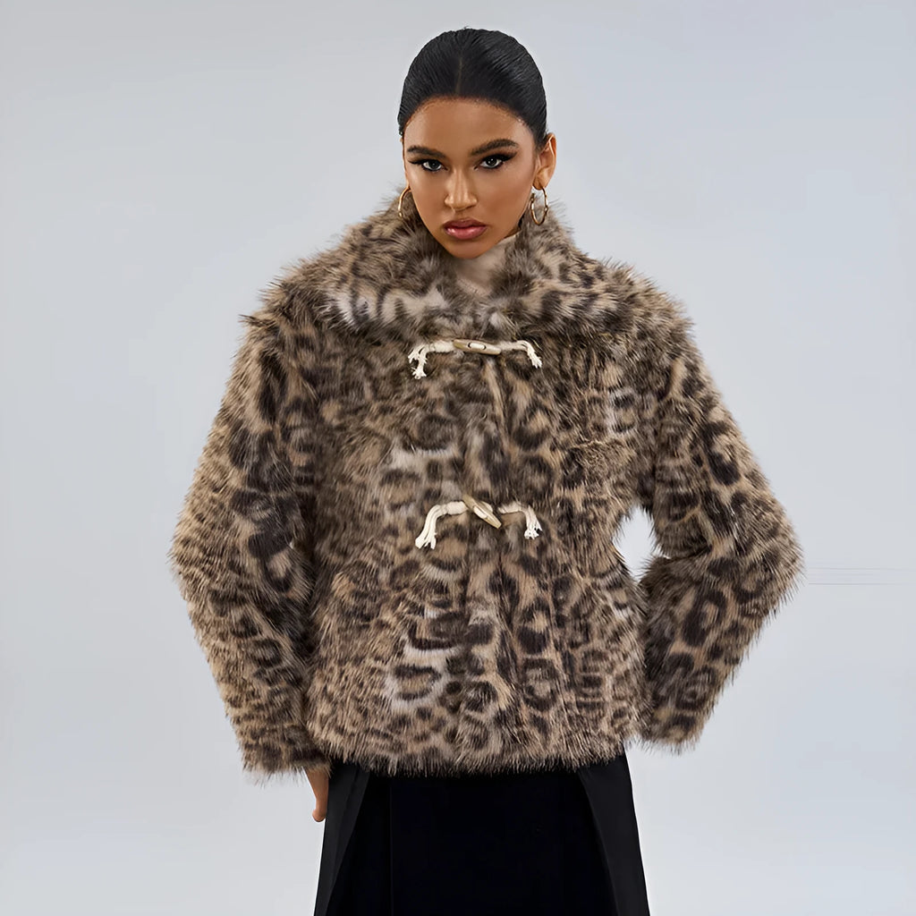 Women's leopard print polyester coat with a buckle lapel closure on a hanger.