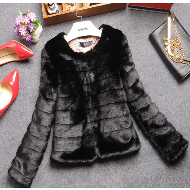 Women's short-length faux fur top in beige, shown on a model.