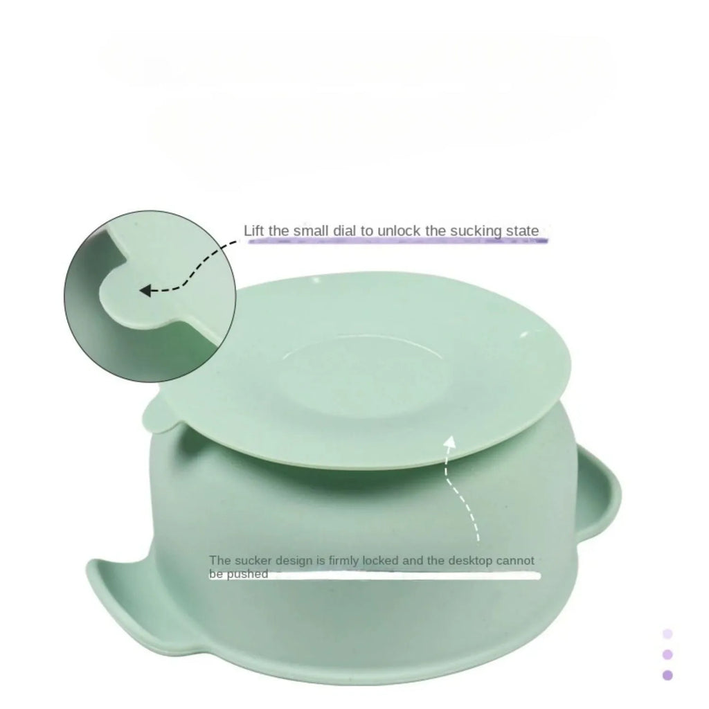 Blue silicone pet bowl for dogs and cats with a non-slip suction cup base on a hardwood floor.