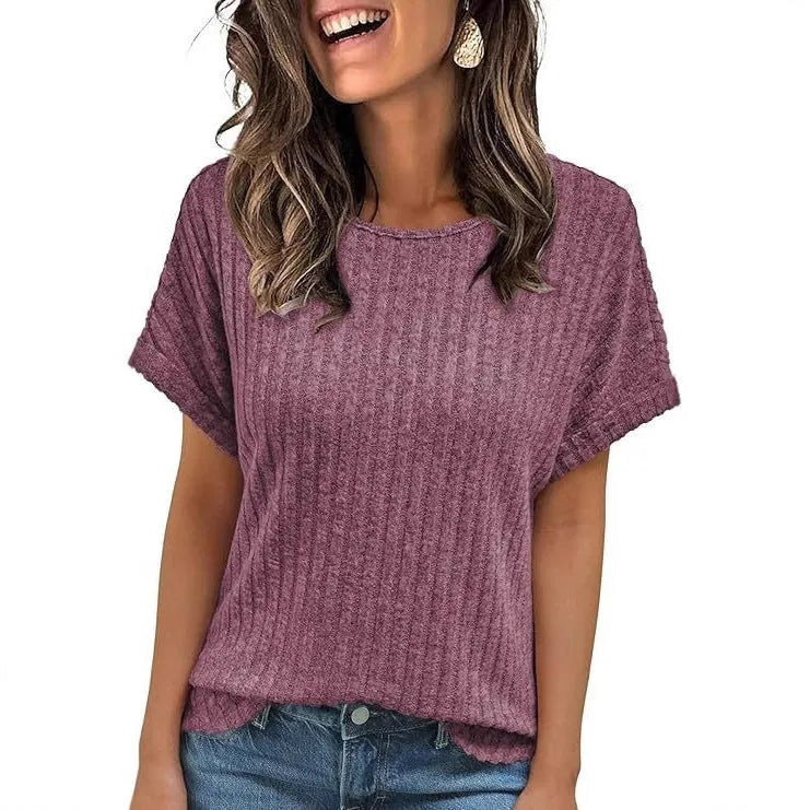 Women's loose fit short-sleeved t-shirt with round neck and sunken stripe detail, solid colour, front view