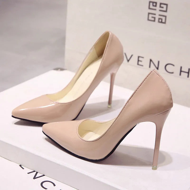 Women's nude ultra-high heel pointed toe PU shoes with carved wing pattern and 10cm heel