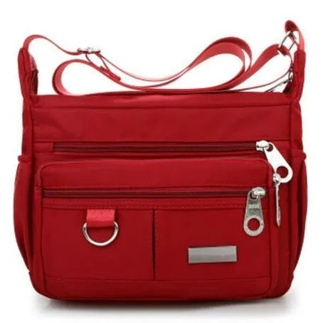 Women's waterproof nylon crossbody shoulder bag with multiple pockets in black