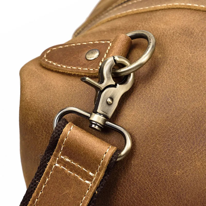 Genuine cowhide leather large capacity luggage bag in light brown with zipper closure and top handles