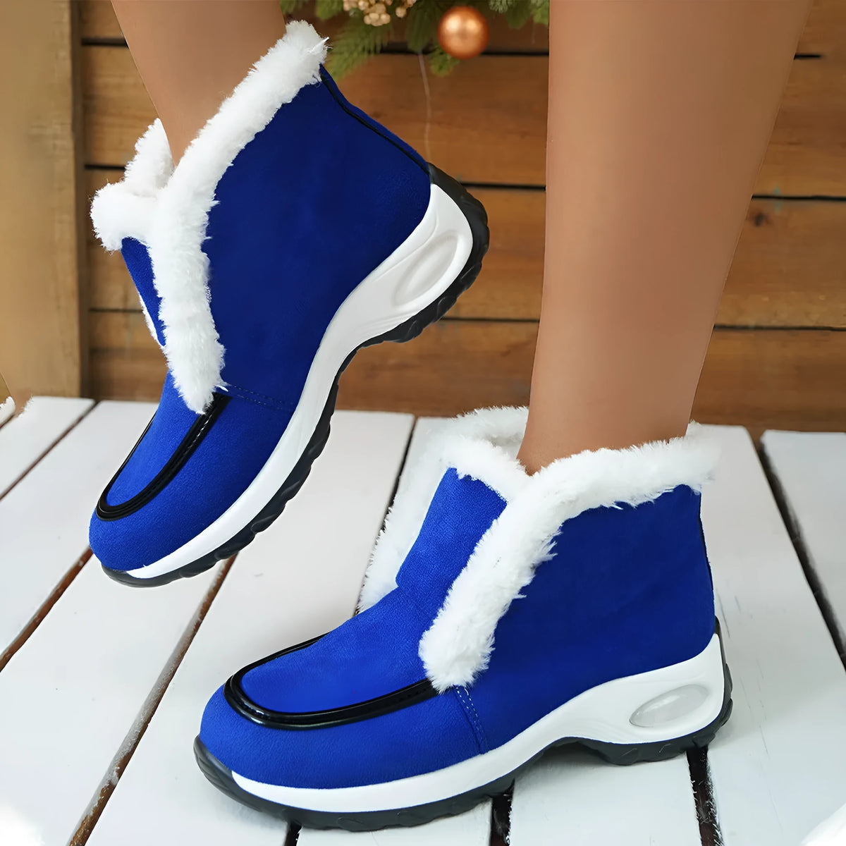 Women's winter snow boots with cotton upper, air-cushion rubber sole, and round toe in leopard print
