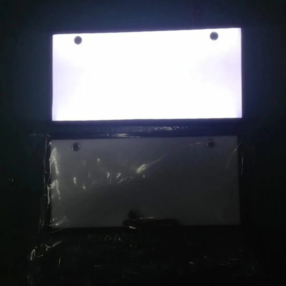 Two LED license plate lights for trucks with plastic housing and uniform illumination