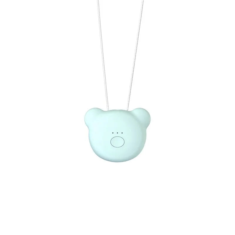 Mini USB portable air purifier necklace in blue, shown worn and with USB cable.