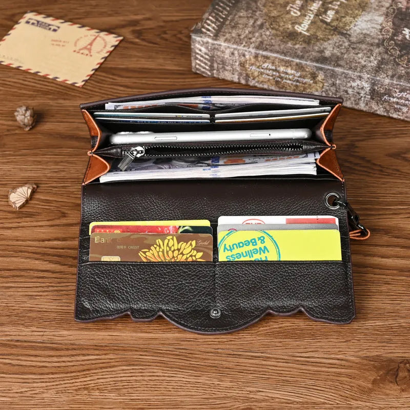Chinese style brown embossed floral tri-fold women's wallet made from first layer cowhide, shown open and closed.