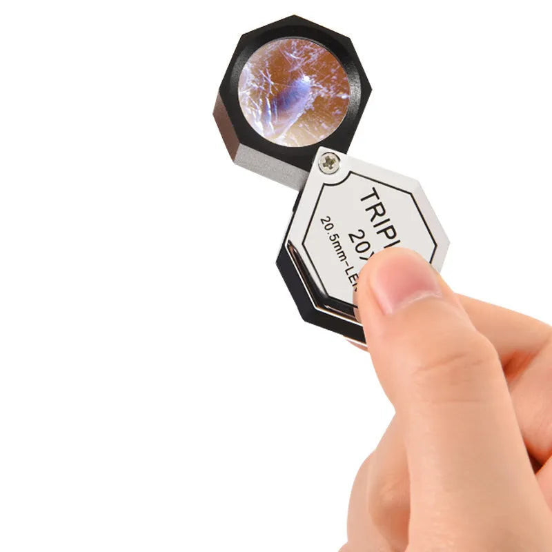 Handheld portable magnifying glass with metal optical glass lens for jewellery and coin inspection