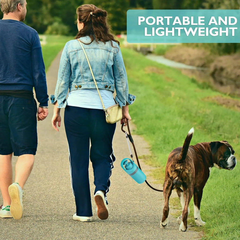 Blue portable dog poop scooper with built-in bag dispenser, clip-on design for leash or harness, 2.7 x 7.4 inches