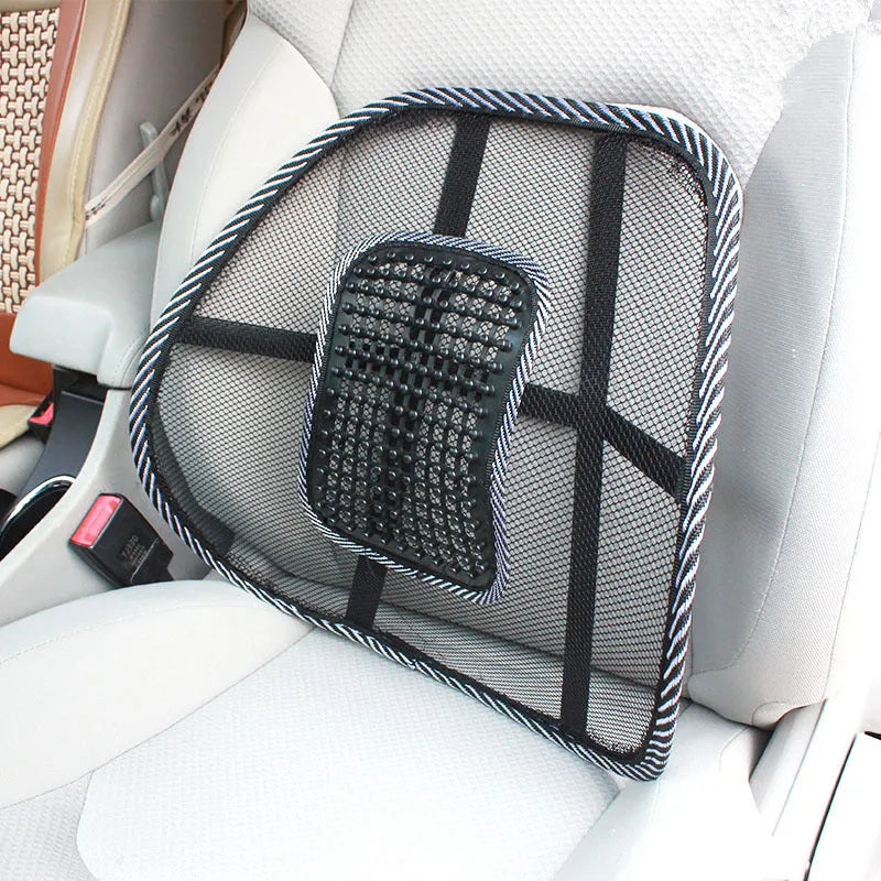 Black car lumbar support pillow with mesh cover on a car seat.