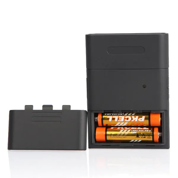 At-838 black handheld alcohol detector breathalyzer with display and mouthpiece on a white background