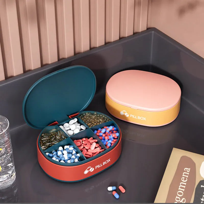 Small 6-grid pill case in dark blue or pink, PP-ABS plastic with silicone ring and double lock