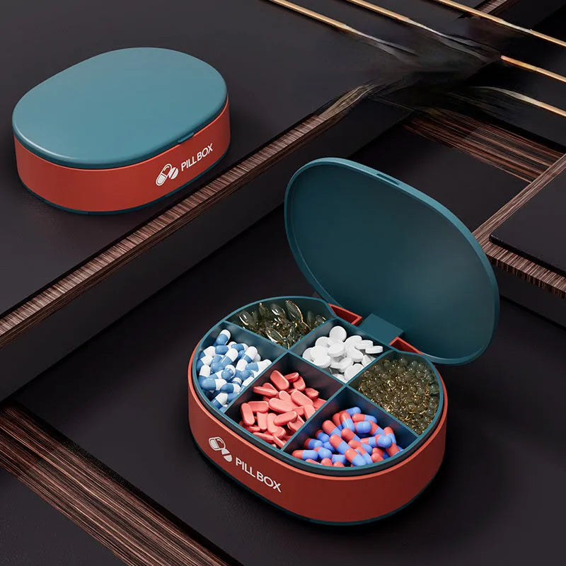 Small 6-grid pill case in dark blue or pink, PP-ABS plastic with silicone ring and double lock