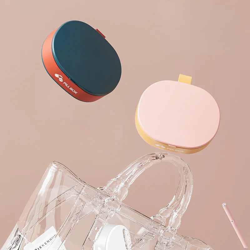 Small 6-grid pill case in dark blue or pink, PP-ABS plastic with silicone ring and double lock