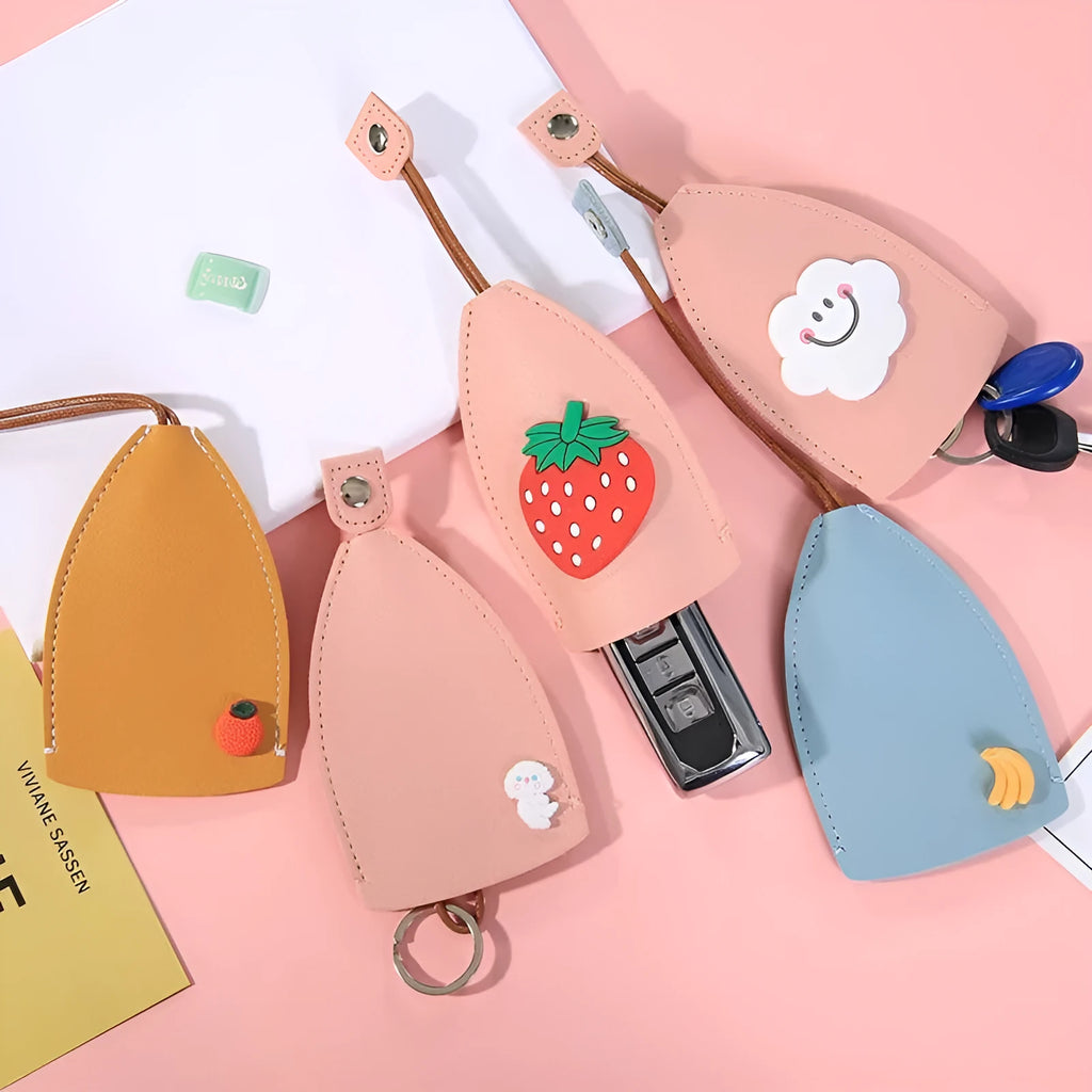 Colourful cartoon and resin design pull-out key case for car keys made from PU leather.