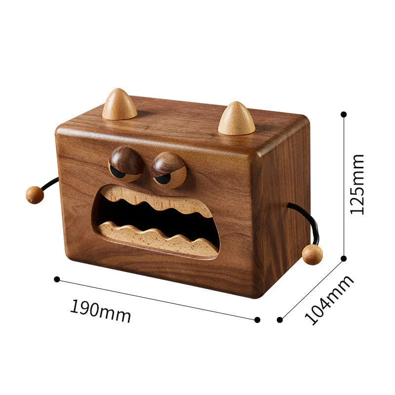 Wooden cartoon Little Monster tissue box in walnut beech finish, 190mm long by 104mm wide by 125mm tall