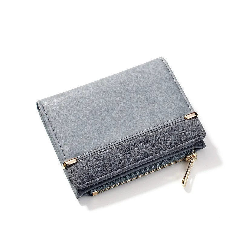 Ladies folding wallet with zipper closure and multiple internal compartments in PU leather