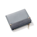 Ladies folding wallet with zipper closure and multiple internal compartments in PU leather