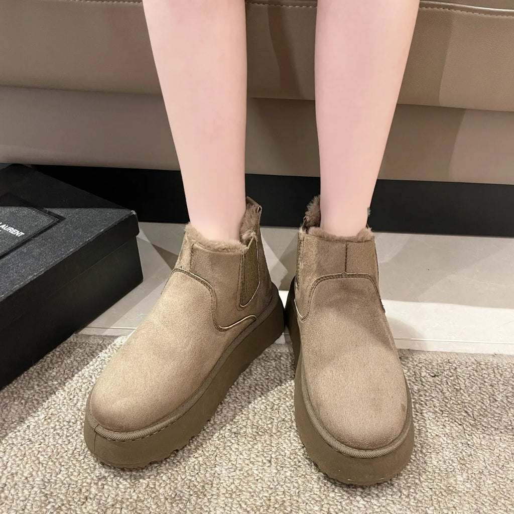 Women's plush snow boots in milky white with flat heel, round toe, faux PU upper, and short plush lining