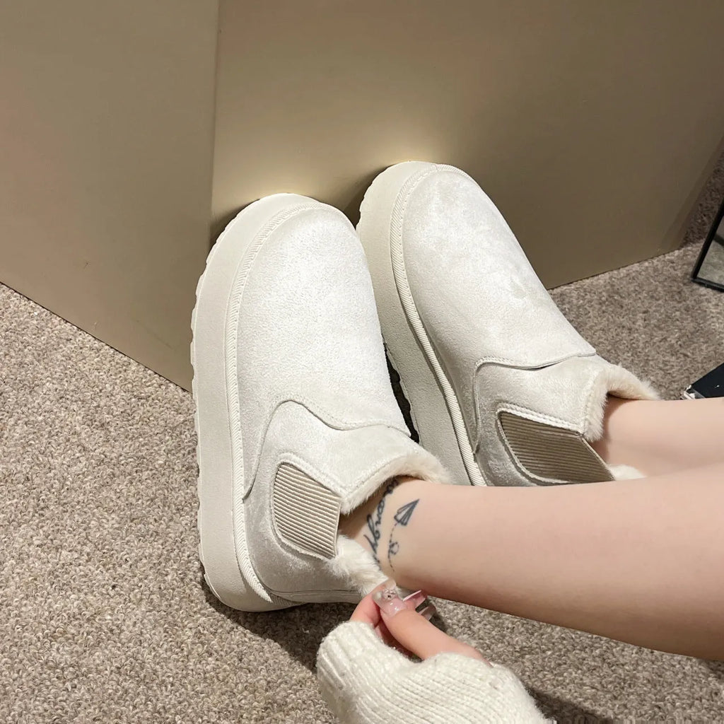 Women's plush snow boots in milky white with flat heel, round toe, faux PU upper, and short plush lining