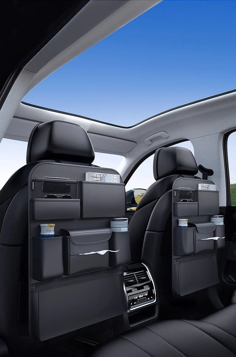 Black leather car seat back hanging storage bag with handle for vehicle organisation