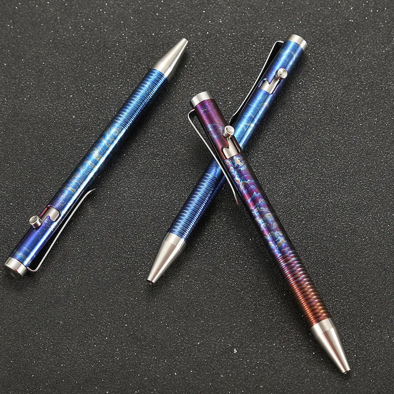 Titanium alloy gun bolt handle ball pen in a multicolour phantom finish, showing bolt action mechanism.