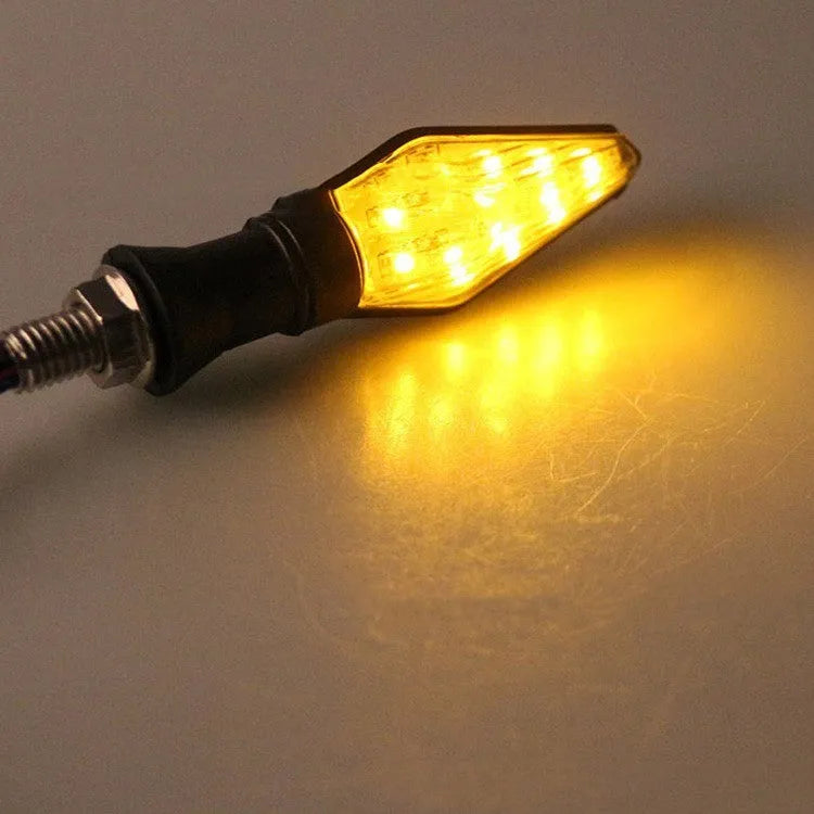 Motorcycle modified turn signal light with double-sided luminous function and yellow/blue light options
