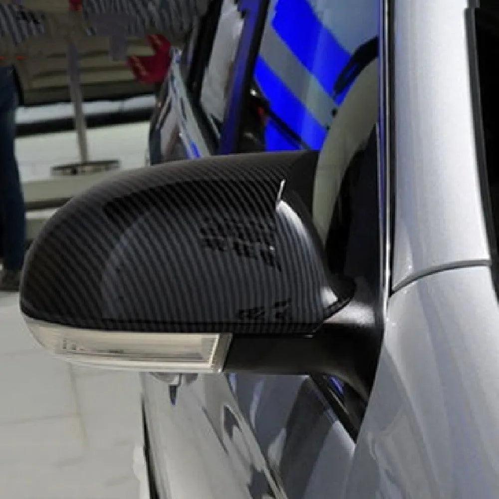Pair of horn bright black plastic mirror reflector shells for Volkswagen Old Sagitar (2006-2011).