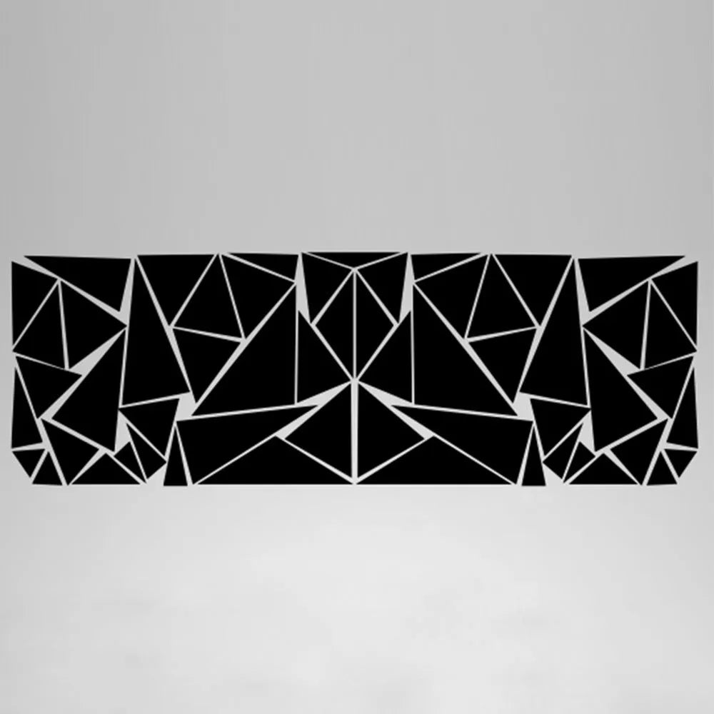 Long black geometric pattern car sticker laid flat, showing its 200cm length for wheel arch application.