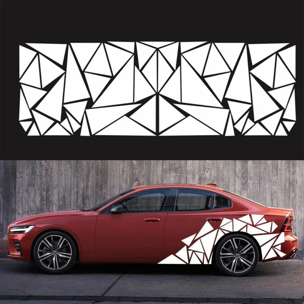 Long black geometric pattern car sticker laid flat, showing its 200cm length for wheel arch application.