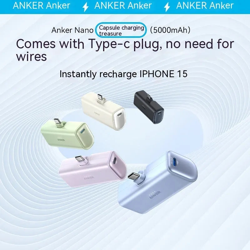 Small capsule-shaped power bank in multiple colours showing built-in foldable USB-C cable and compact size.