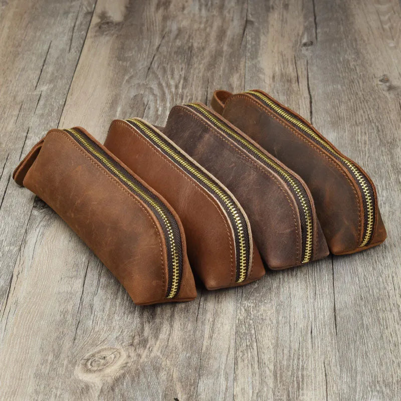 Square handmade genuine cowhide leather pencil case with zipper in black, brown, dark brown, or yellow.