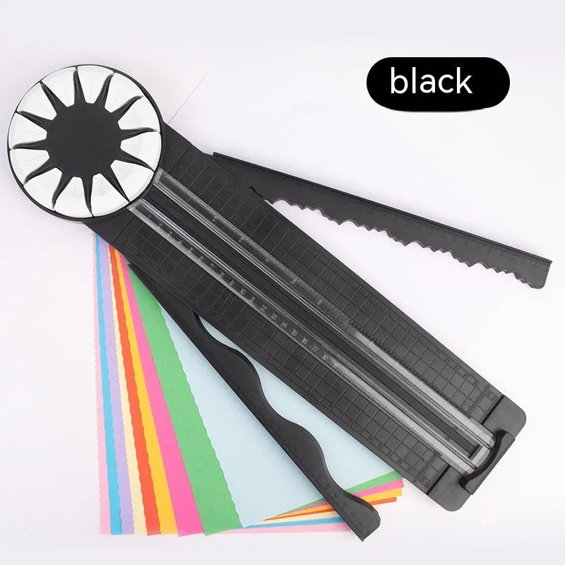 Pink 12-in-1 multifunctional paper cutting machine with dotted guide lines on its base.