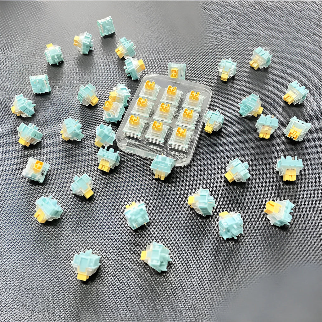 Pack of 36 Sea Salt Lemon coloured Tiger Mo PRO mute mechanical keyboard switches.