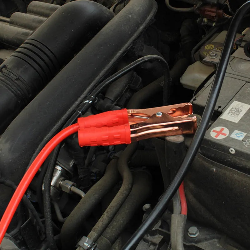 Car battery emergency jump-start cable kit with black and red clips on 2 metre cables