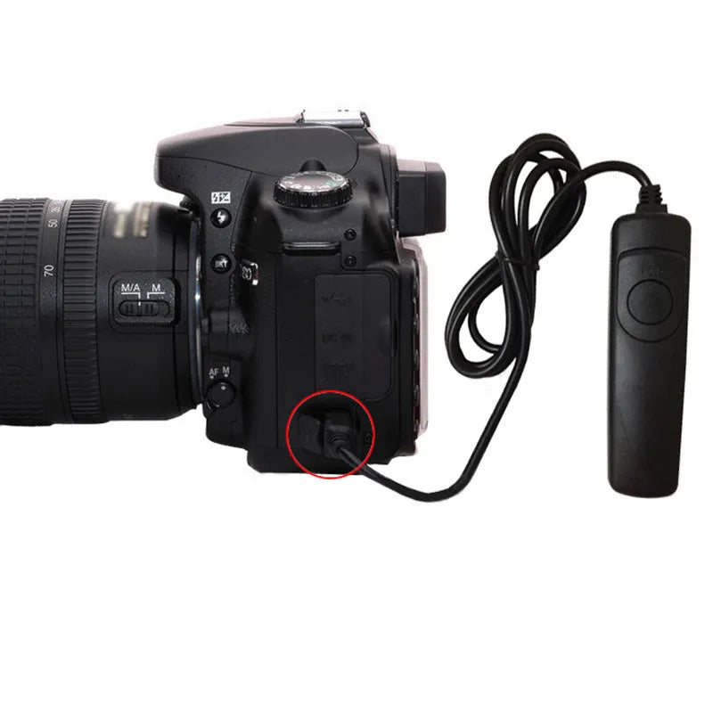 Black plastic wired cable release shutter remote for Canon EOS cameras on white background