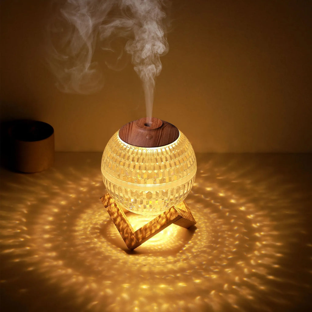 Crystal ball humidifier round 116 mm USB with atmosphere sea light on a desk