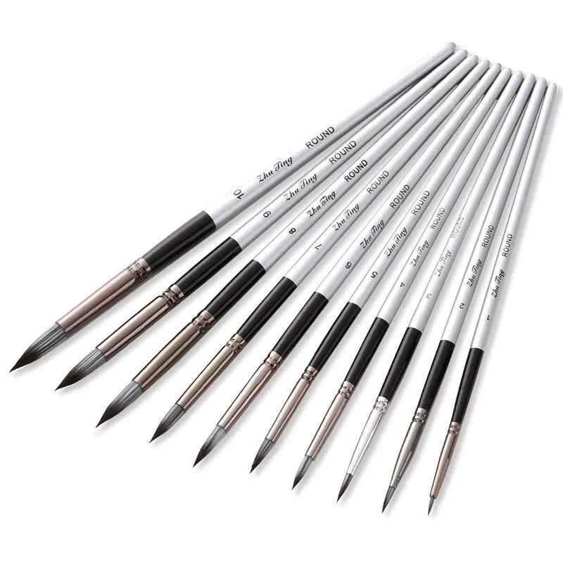 Ten black stick nylon paintbrushes with round tips, silver gray rods, and wood handles laid out