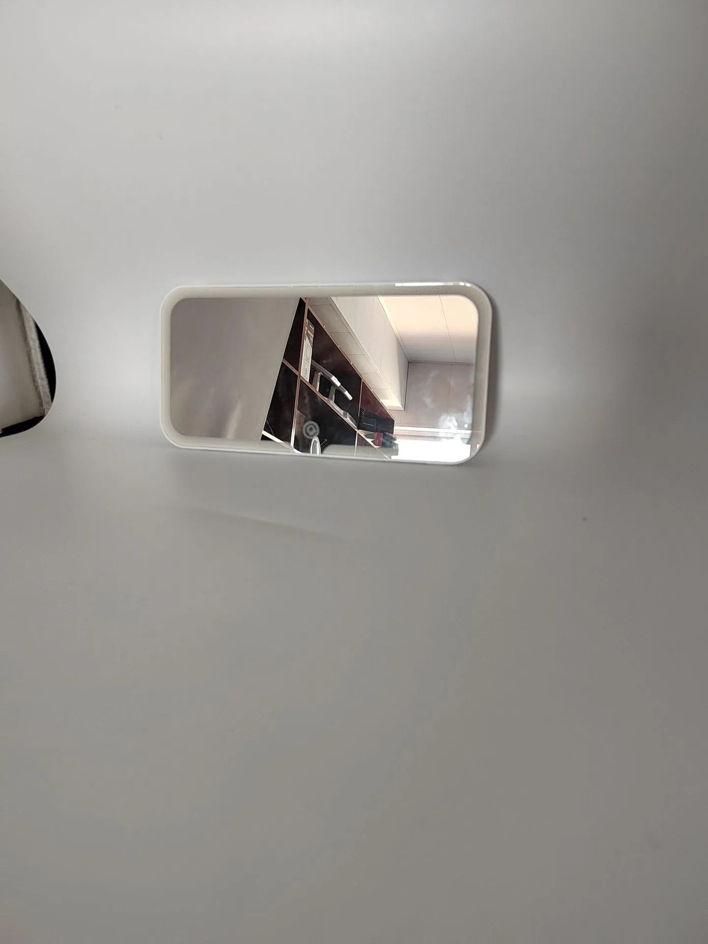 White car sun visor with integrated LED make-up mirror, ABS frame, aluminium lens, 24.2x12x1.5 cm dimensions