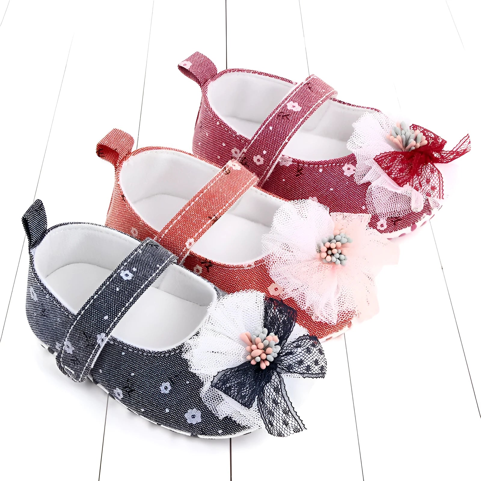 Baby princess shoes with soft sole, cotton upper, and Velcro fastening in blue fuchsia and orange colours