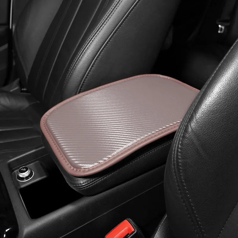 Leather carbon fibre pattern armrest mat for car centre console measuring 29 by 19 centimetres