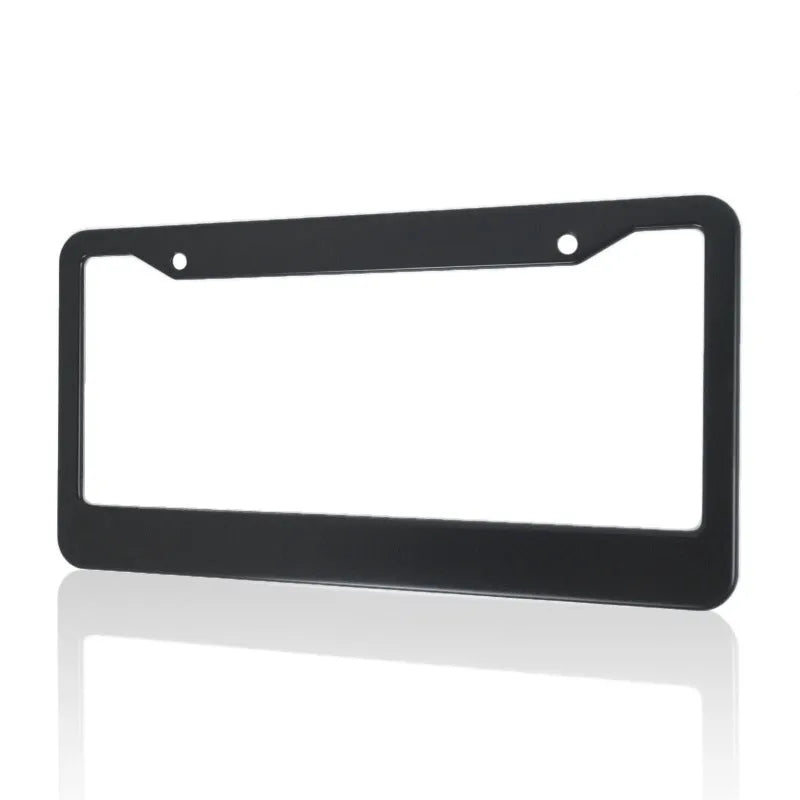 Minimalist black aluminium alloy license plate frame with round holes for an American Standard car.