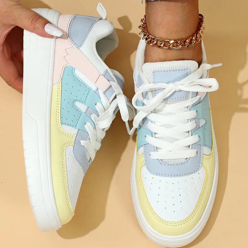 Trendy platform sneakers in white and yellow with breathable mesh upper, lace-up closure, and mid heel sole