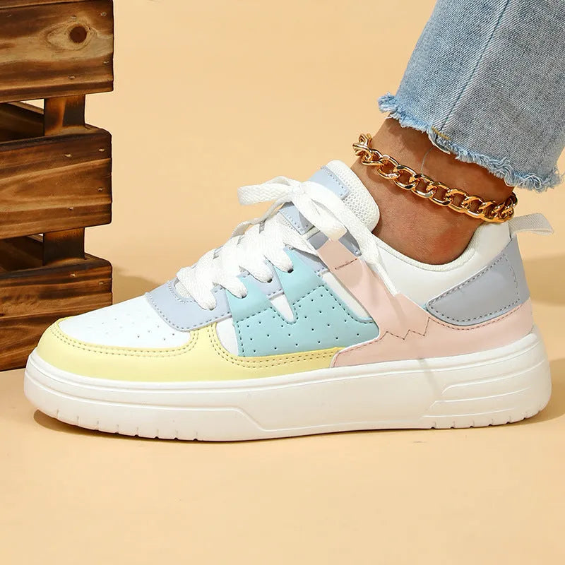 Trendy platform sneakers in white and yellow with breathable mesh upper, lace-up closure, and mid heel sole