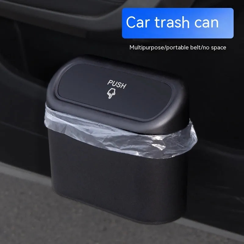 Black folding car trash bin with waterproof plastic construction for vehicle seat mounting